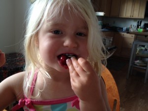 Happy Child with Cherries