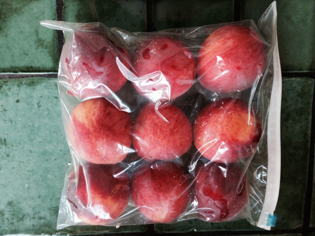 whole peaches ready for freezing